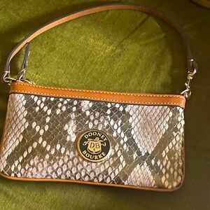 Dooney +Bourke Leather wrislet purse with gold snake skin